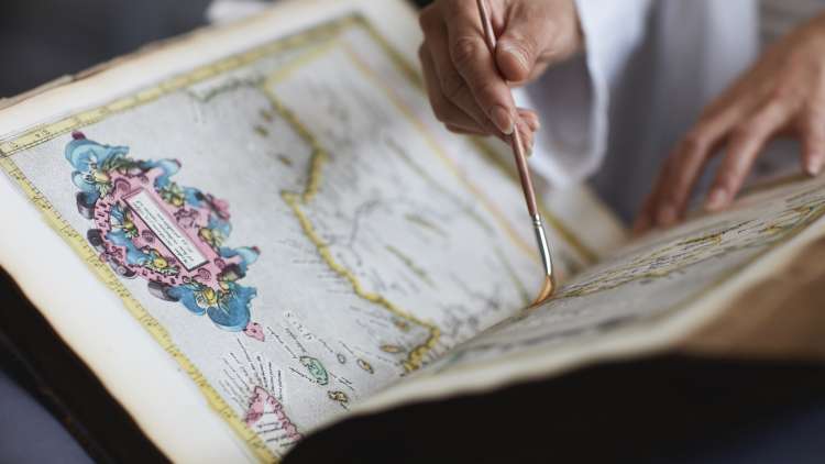 A book being conserved in Senate House Library Special Collections