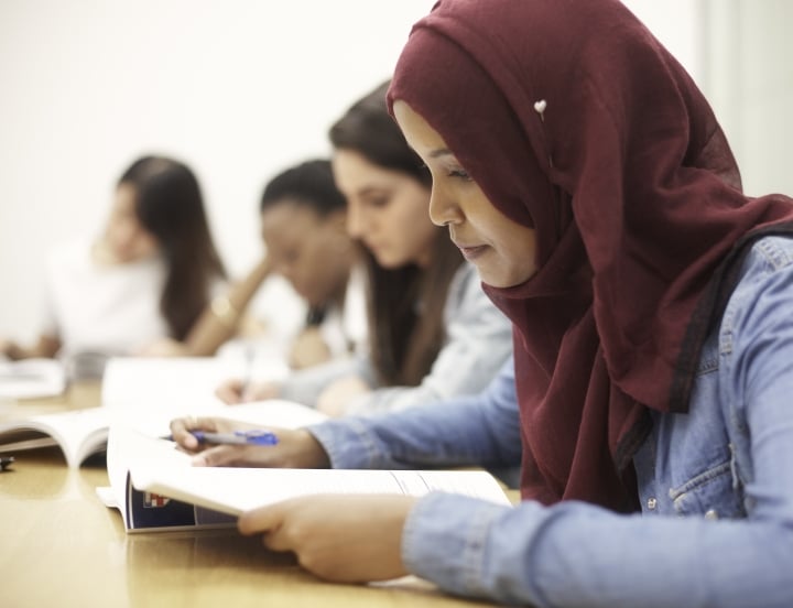 Students reading in a classroom 